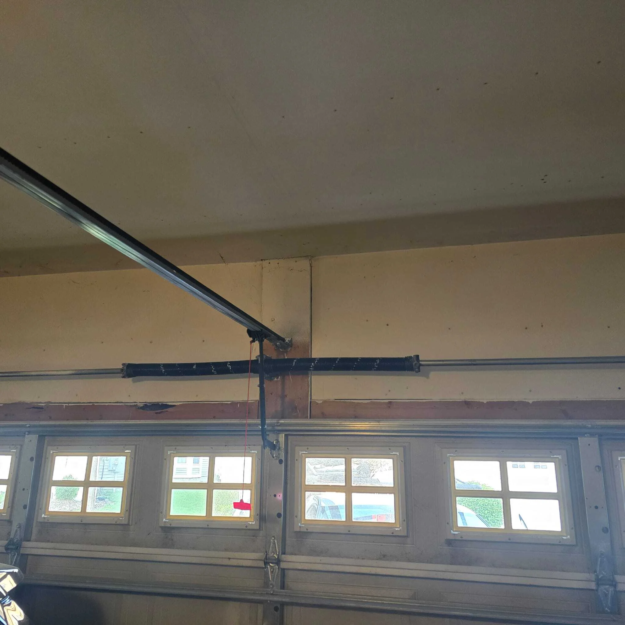 garage door spring repair after